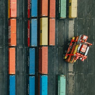 Close-up overhead image of trailers in port.
